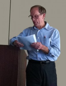 guy standing at a podium